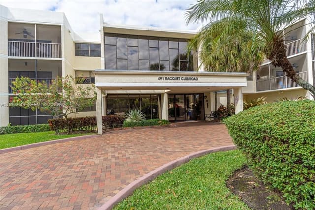 491 E Racquet Club Road 107, sold in Bldg 130 Of Country Club, Weston, FL