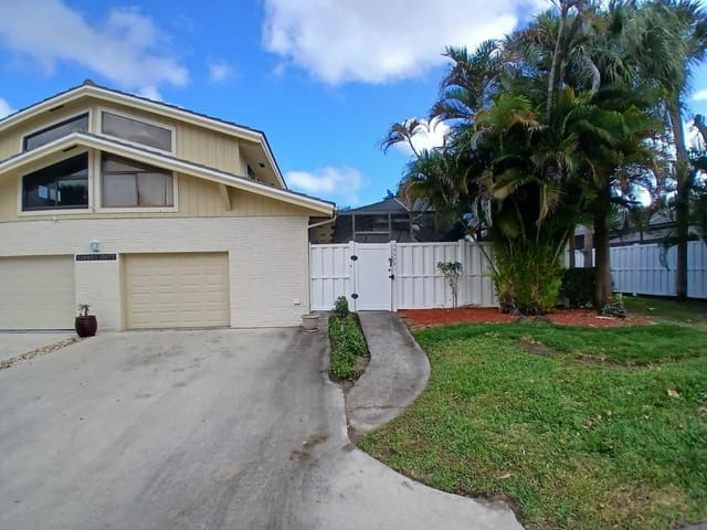 12672 Woodmill Drive, sold in Westwood Lakes 4 Westwood Gardens, Palm Beach Gardens, FL