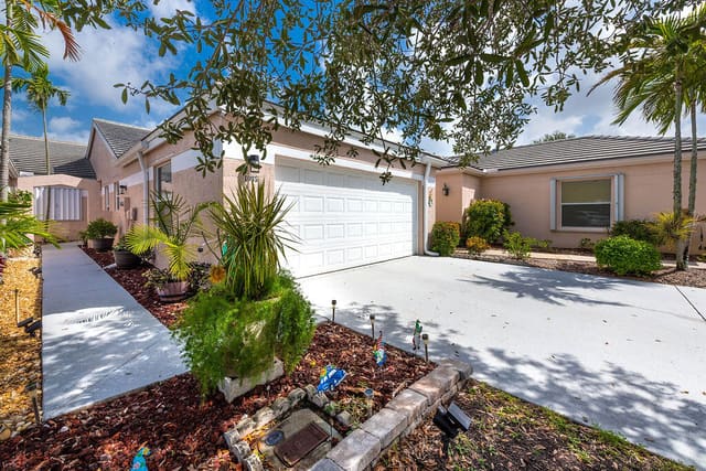 1035 Island Manor Drive, sold in Island Of River Bridge, Greenacres, FL