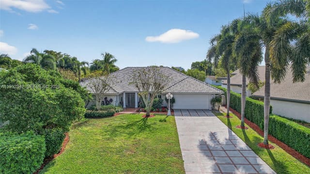 8704 Mahogany Avenue, sold in Jacaranda Area 12-C, Plantation, FL