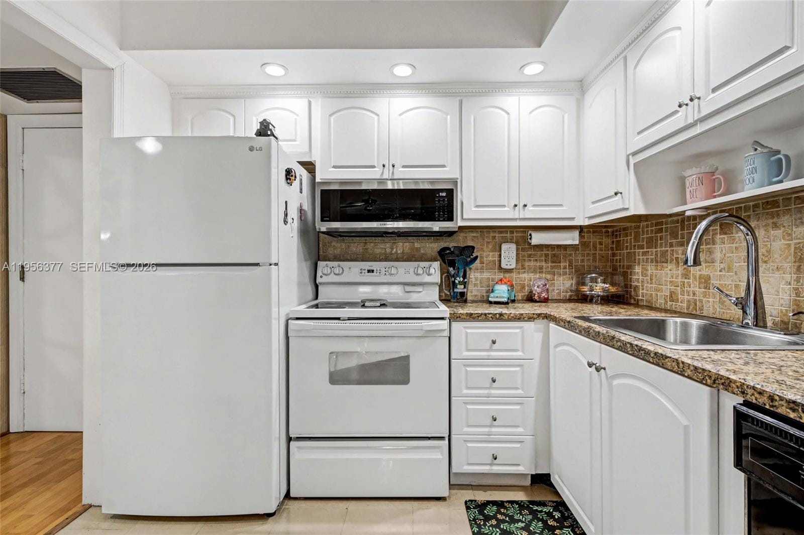 5661 SW 2nd Court 101 — photo 5