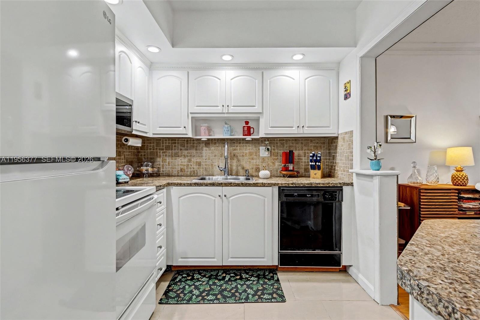 5661 SW 2nd Court 101 — photo 7