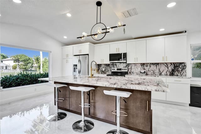 5380 NW 117th Avenue, sold in Wyndham Circle, Coral Springs, FL