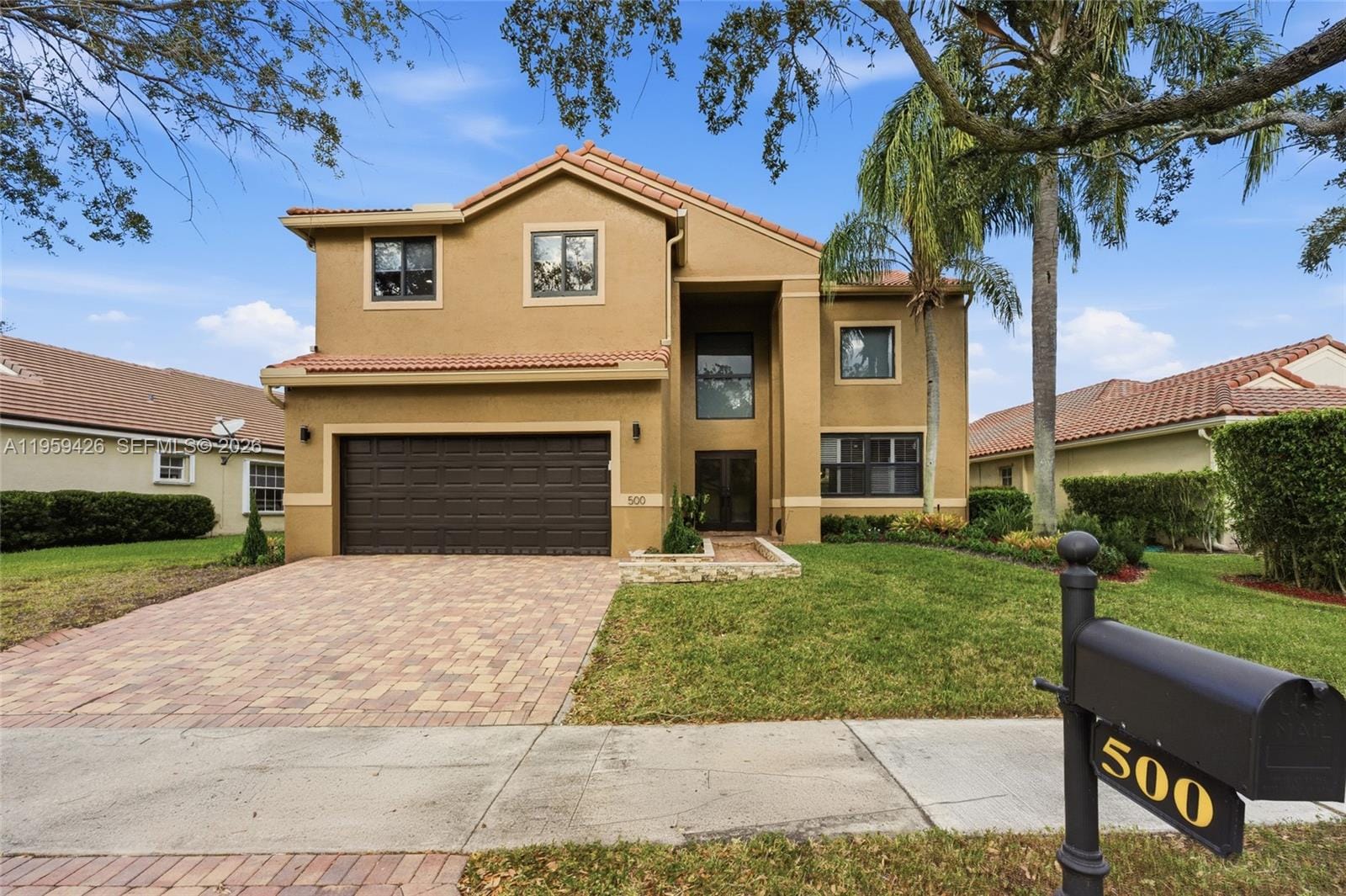 500 Cambridge Drive, Weston, FL 33326 - photo 1 of 30