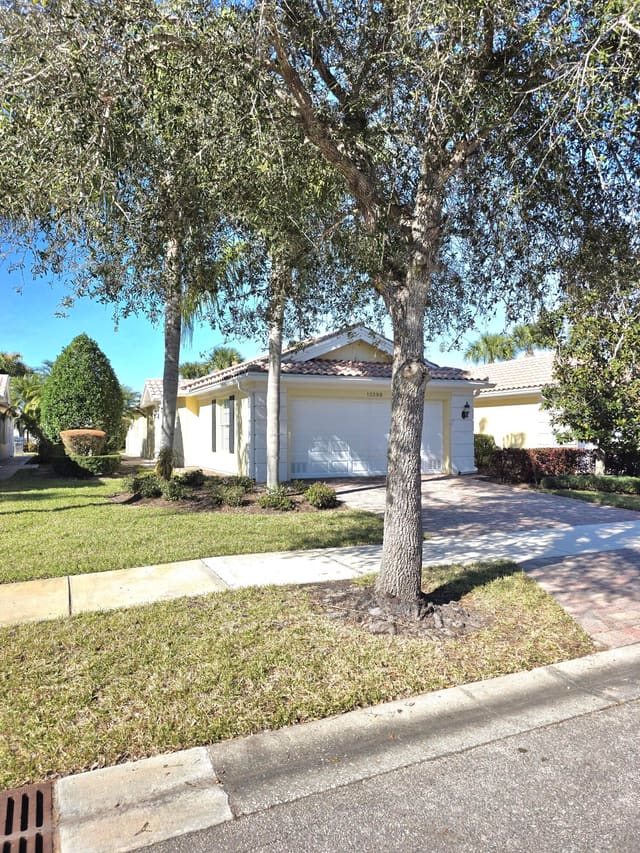 10399 SW Stratton Drive, sold in The Lakes At Tradition, Port St Lucie, FL