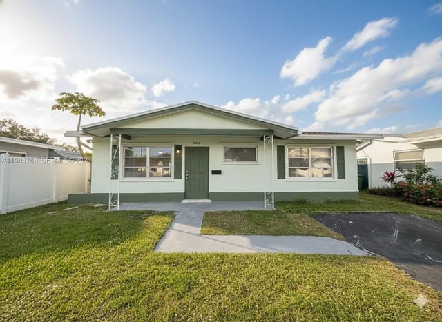 5404 NW 26th Road, sold in Tamarac Lakes North 3rd S, Tamarac, FL