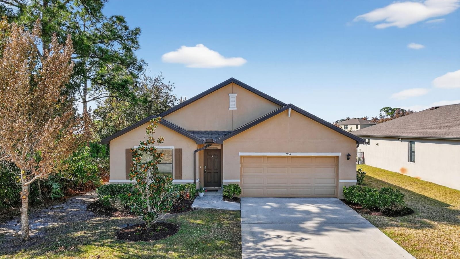 6556 NW Oaklawn Way — photo 1