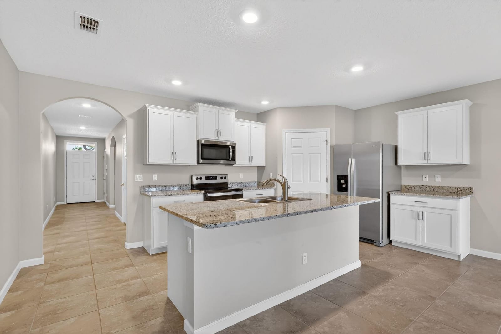 6556 NW Oaklawn Way — photo 2