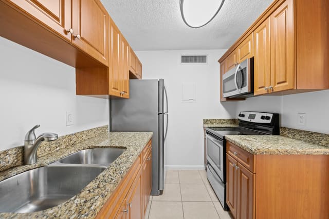 639 Executive Center Drive O-105, sold in Eden Place Condo, West Palm Beach, FL