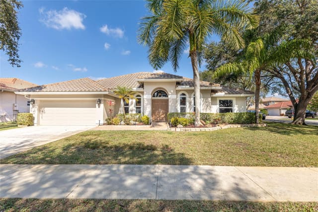 3907 NW 56th Street, sold in Winston Park Sec Two A, Coconut Creek, FL