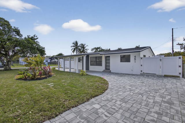 451 Dionne Drive, sold in Ranch House Estates, West Palm Beach, FL