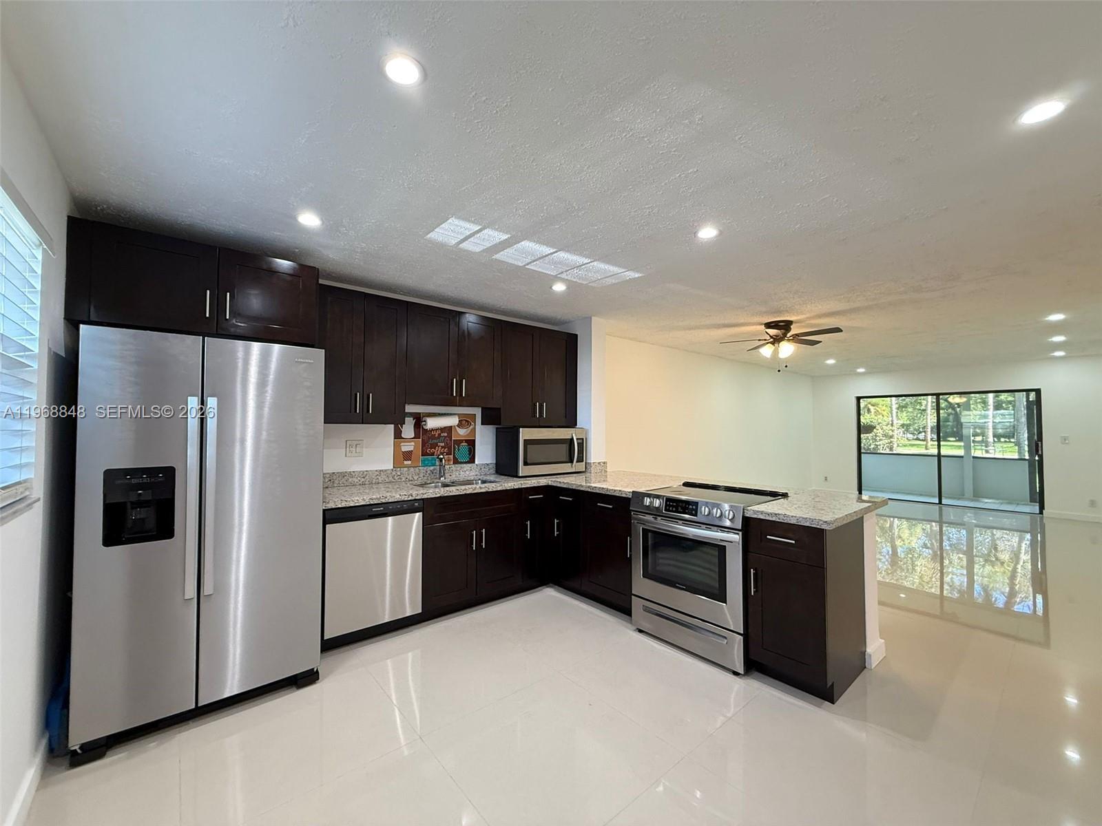 6095 N Sabal Palm Boulevard 103, Tamarac, FL 33319, Tamarac