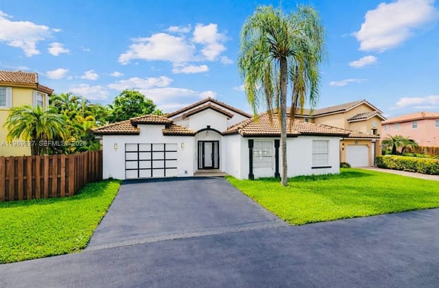 9166 SW 168th Court, sold in Forest Lakes Townhomes, Miami, FL