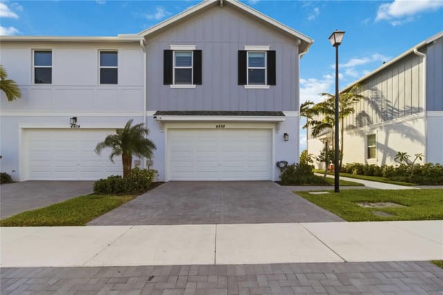 4898 N Longwood Lake Square, sold in Terraces Of Westlake, Westlake, FL