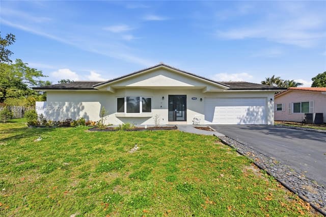 8555 NW 25th Place, sold in Forest Hills South, Coral Springs, FL