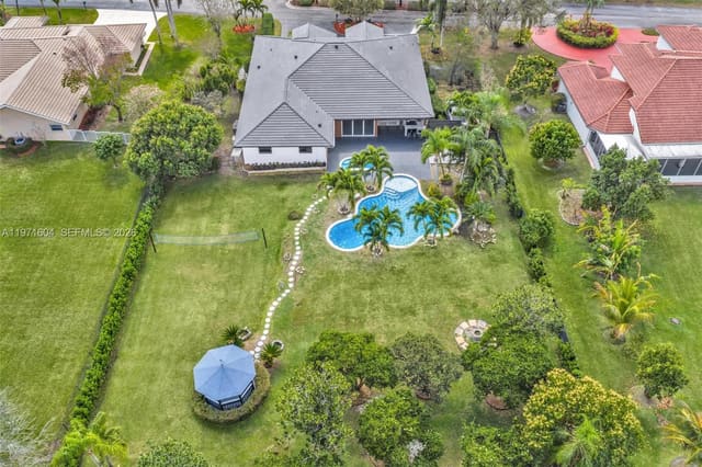 12555 SW 34th Place, sold in Kapok Village Estates, Davie, FL