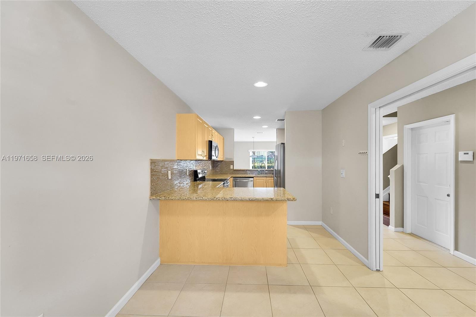 9840 NW 19th Place — photo 3