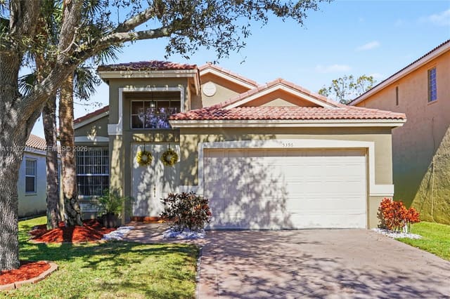 5396 NW 126th Drive, sold in Wyndham Lakes North, Coral Springs, FL