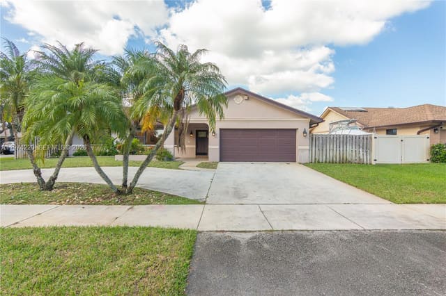 11945 SW 54th Street, sold in Flamingo Gardens-Tamarind, Cooper City, FL