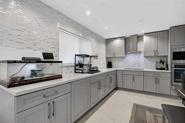 221 NE 212th Street, sold in San Simeon Homes, Miami, FL