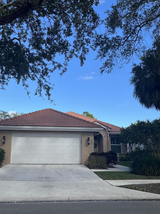 144 Hampton Circle, sold in Hamptons At Maplewood, Jupiter, FL