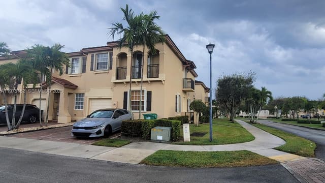 12842 SW 134th Street, sold in Courts At Tuscany, Miami, FL