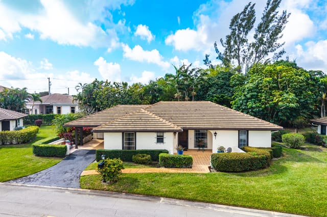 446 Pine Villa Drive, Atlantis, FL 33462