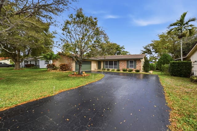 8611 NW 29th Drive, sold in Forest Hills, Coral Springs, FL