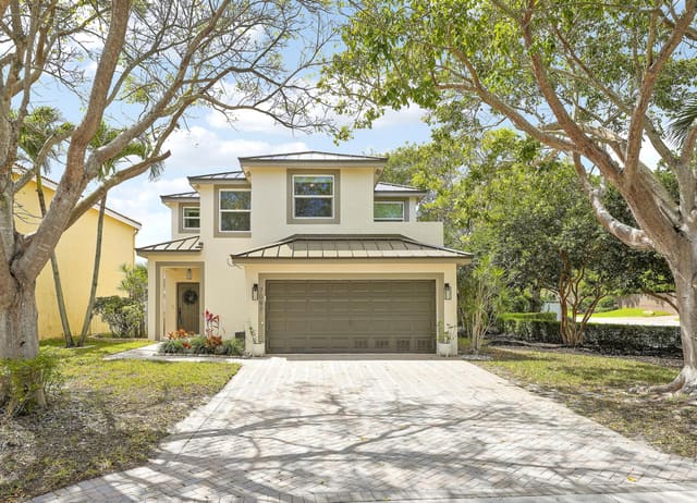 7097 Crescent Creek Lane, sold in Coconut Point, Coconut Creek, FL