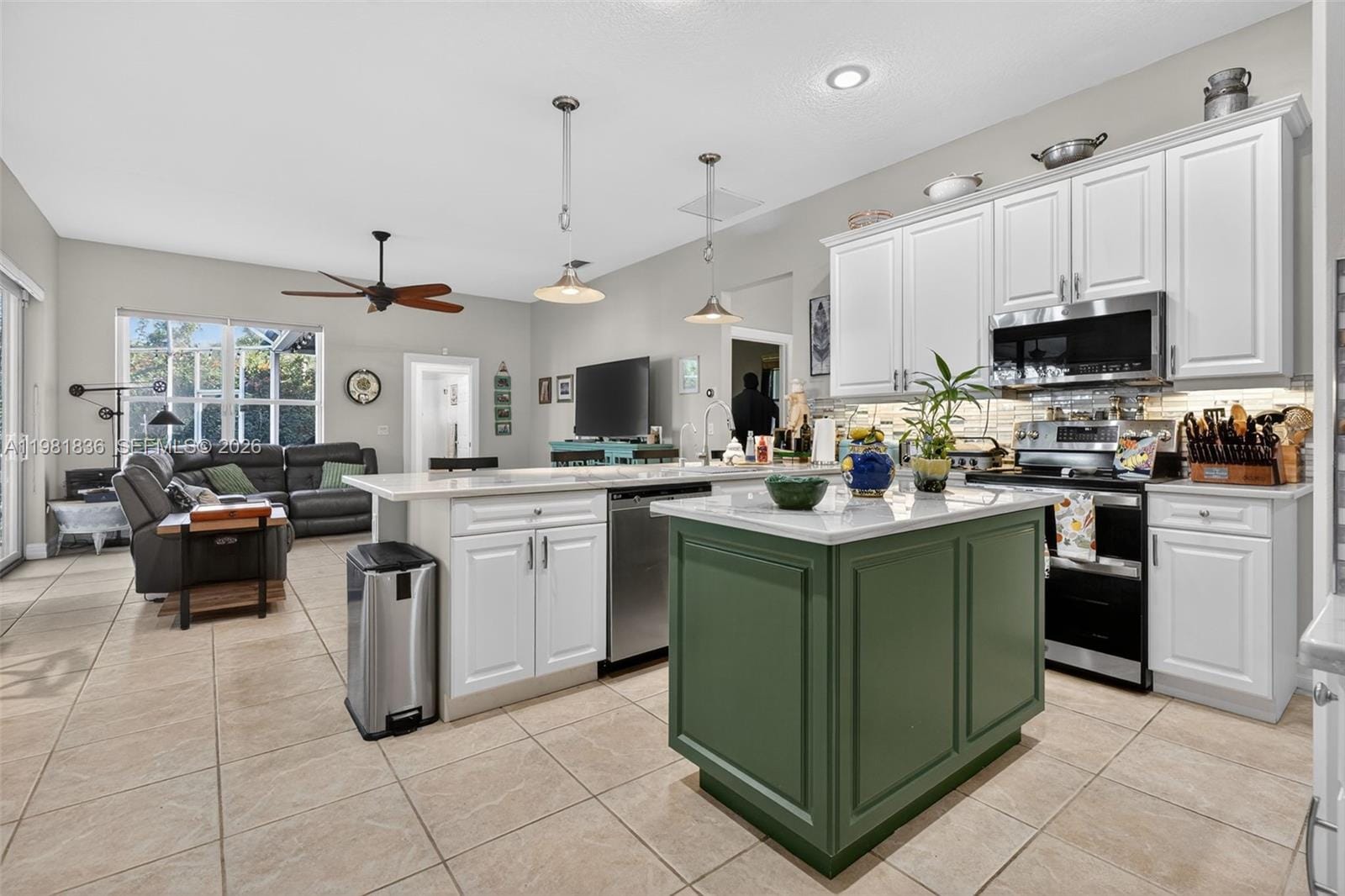 7702 SE Mammoth Drive, Hobe Sound, FL 33455 photo 5