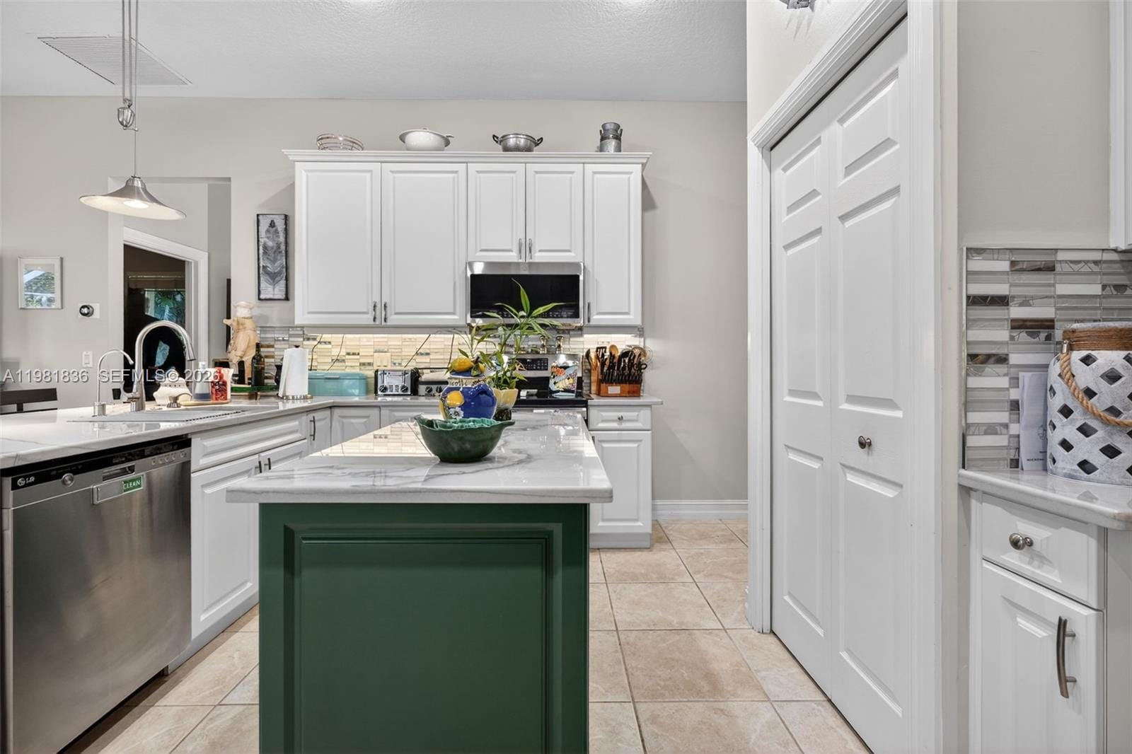 7702 SE Mammoth Drive, Hobe Sound, FL 33455 photo 9