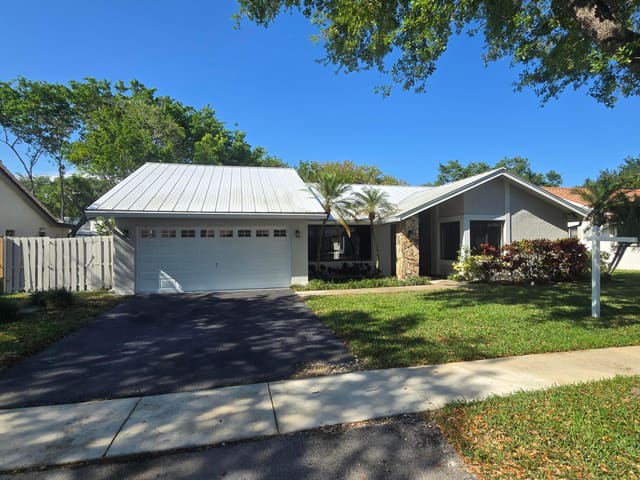 10207 NW 7th Court, sold in Nob Hill Estates, Plantation, FL