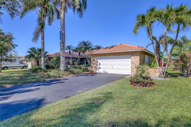1048 NW 110th Lane, sold in Cypress Lakes, Coral Springs, FL