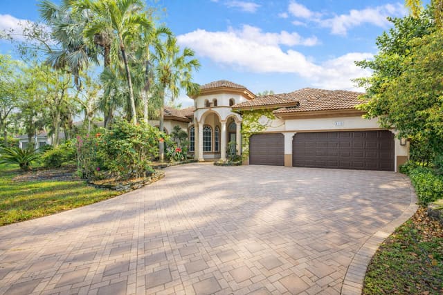 6135 NW 88th Avenue, sold in Grand Cypress Estates, Parkland, FL