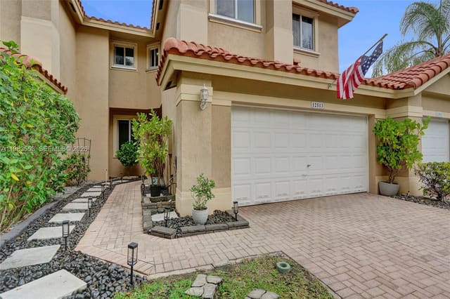 12513 NW 56th Drive, sold in Heron Bay Four, Coral Springs, FL