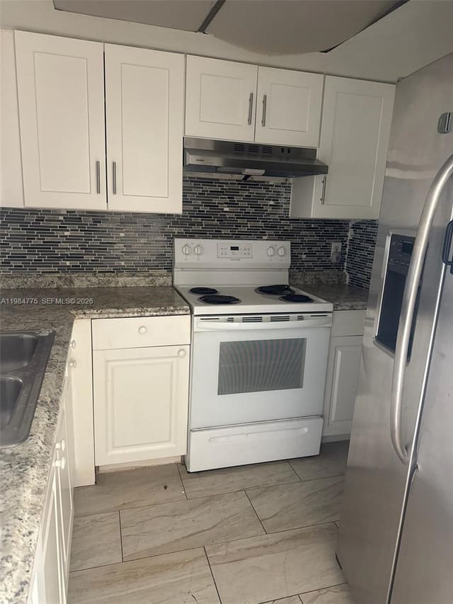 7779 Tam Oshanter Boulevard 14, North Lauderdale, FL 33068