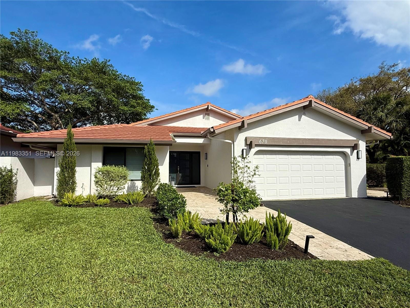 670 Deer Creek Hollows Circle, Deerfield Beach, FL 33442
