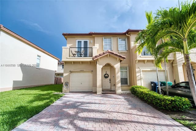 12826 SW 134th Street, sold in Courts At Tuscany, Miami, FL
