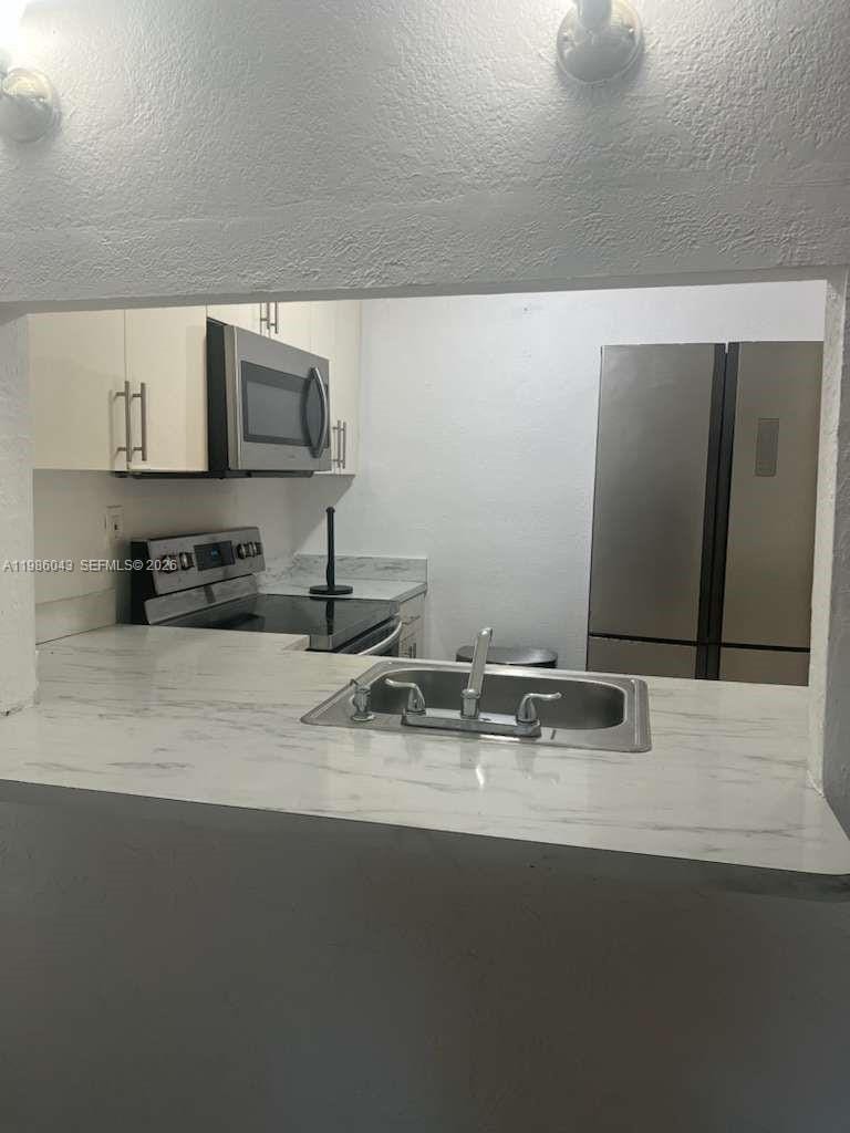 4550 NW 9th Street 114E — photo 2