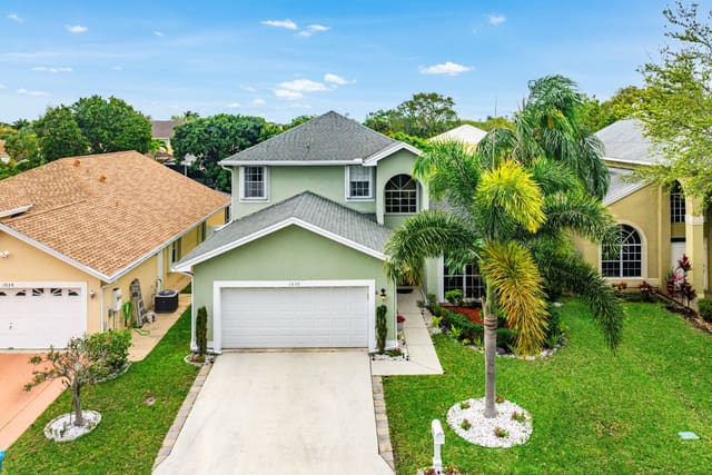 1030 Fairfax Circle W, sold in Lawrence Grove, Boynton Beach, FL
