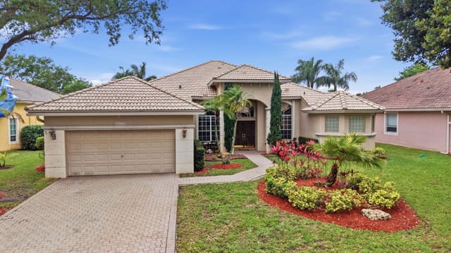 5040 NW 57th Terrace, sold in Coral Creek Replat No 3, Coral Springs, FL