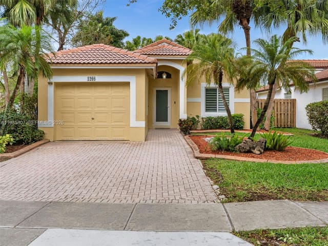 1208 NW 170th Avenue, sold in Lakes Of Western Pines Re, Pembroke Pines, FL