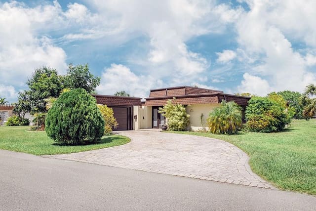 5311 Banyan Lane, sold in Woodlands Sec Six, Tamarac, FL