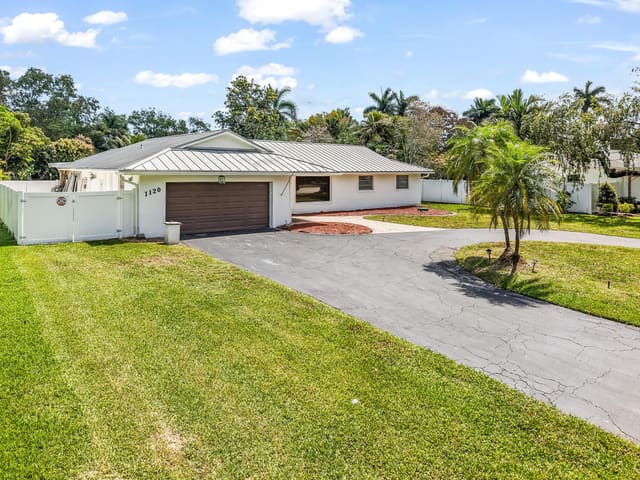 1120 E Tropical Way, sold in Plantation Golf Estates, Plantation, FL