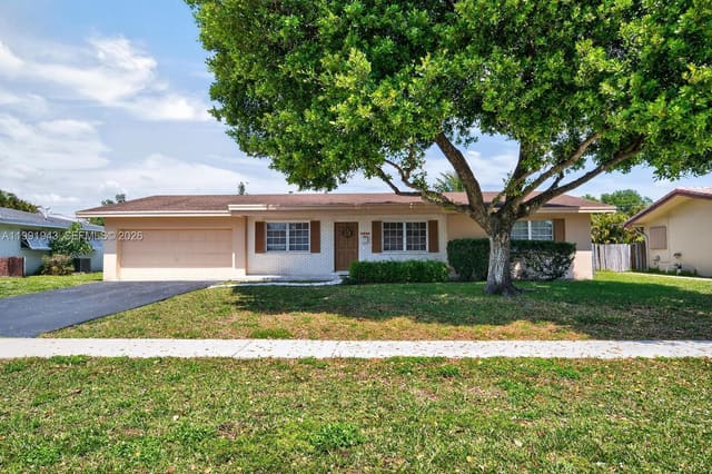 7241 NW 10th Place, sold in Mirror Lake Estates Sec S, Plantation, FL