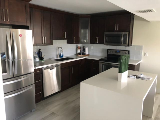 7135 Collins Avenue 525, Burleigh House, Miami Beach, FL