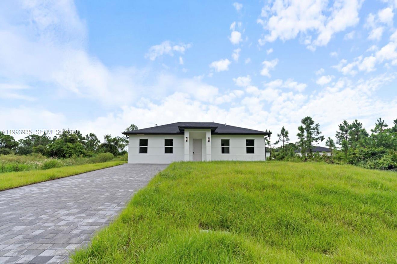 710 Peacock Avenue, Lehigh Acres, FL 33974