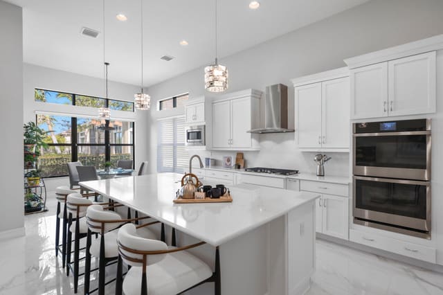9149 E Leon Cir Circle E, sold in Four Seasons At Parkland, Parkland, FL