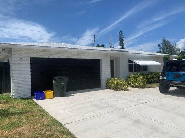 511 NW 50th Place, sold in University Heights, Boca Raton, FL