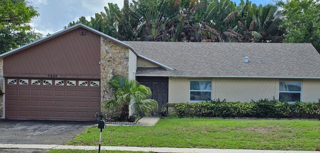 7230 NW 47th Place NW, sold in Boulevard Woods North, Lauderhill, FL